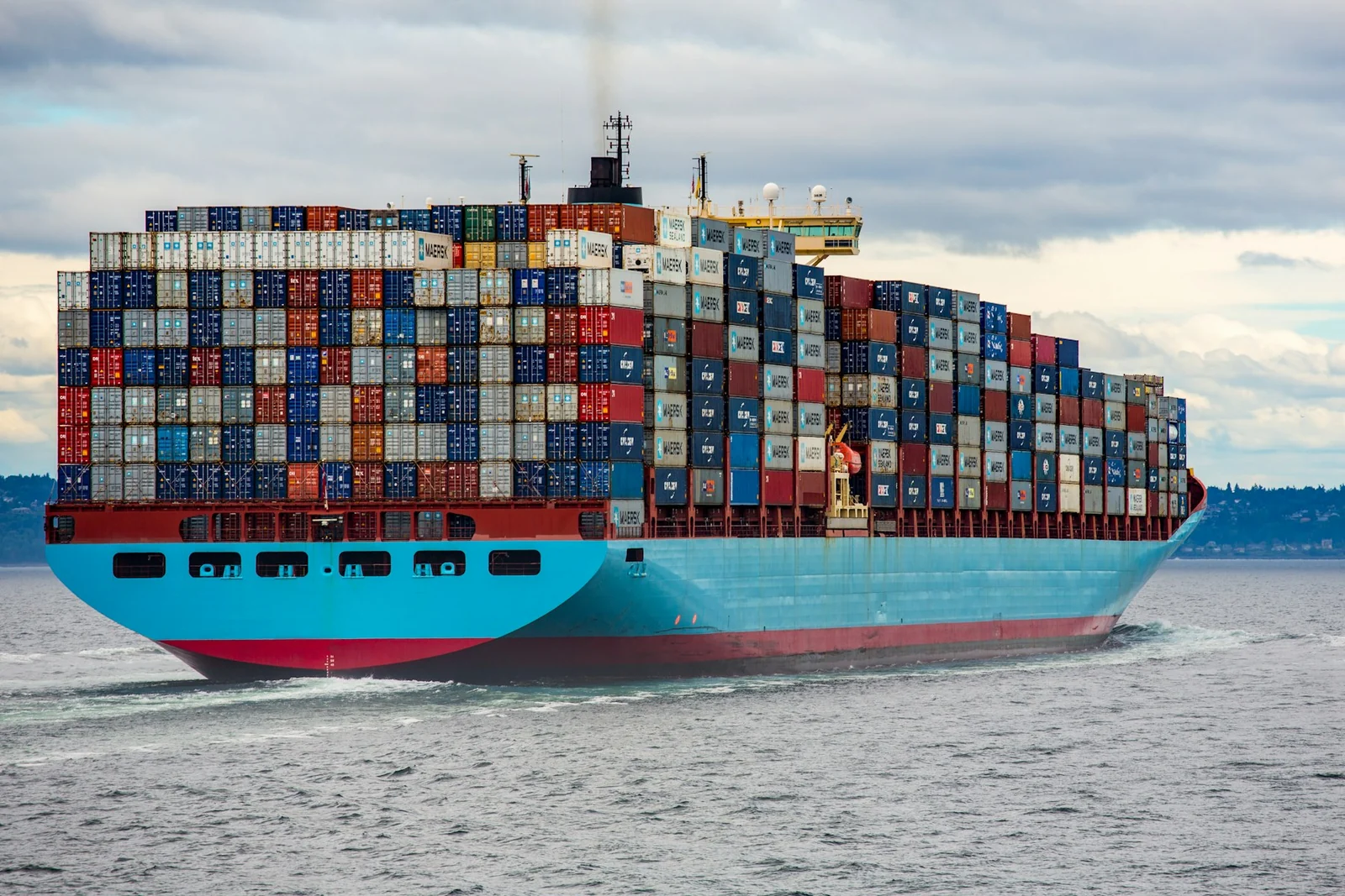 Container ship operating at sea